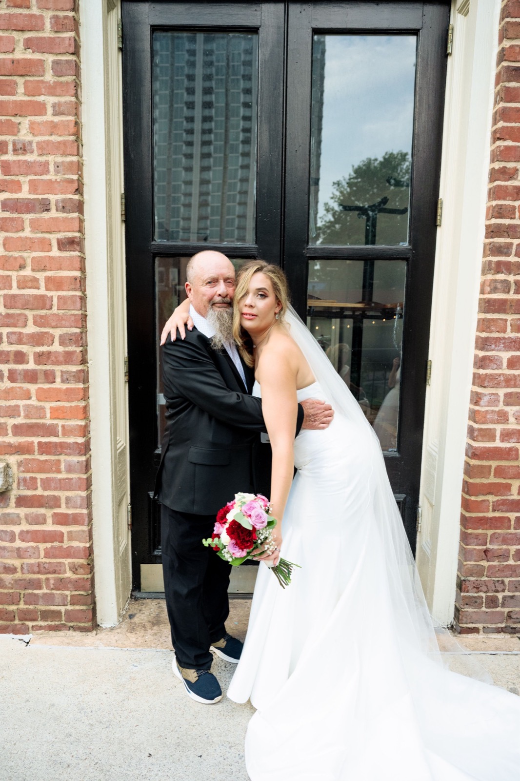 the couple outside in downtown Raleigh